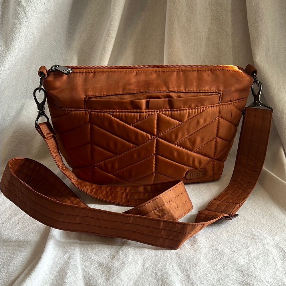 Lug Orange Crossbody Bag with Intricate Stitched Design